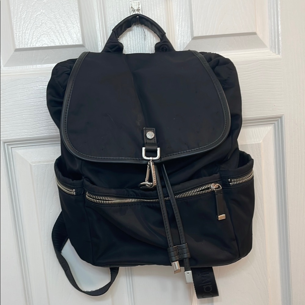 CALVIN KLEIN // black fashion backpack // fold over // TONS of zipper pockets - Picture 1 of 16